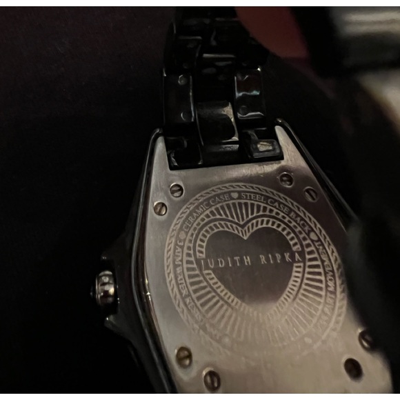 Judith Ripka black ceramic watch w:Arabic numbers at 3, 6, and 9